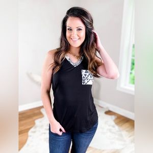 Avery- black tank top with Aztec trim detail and pocket- size medium